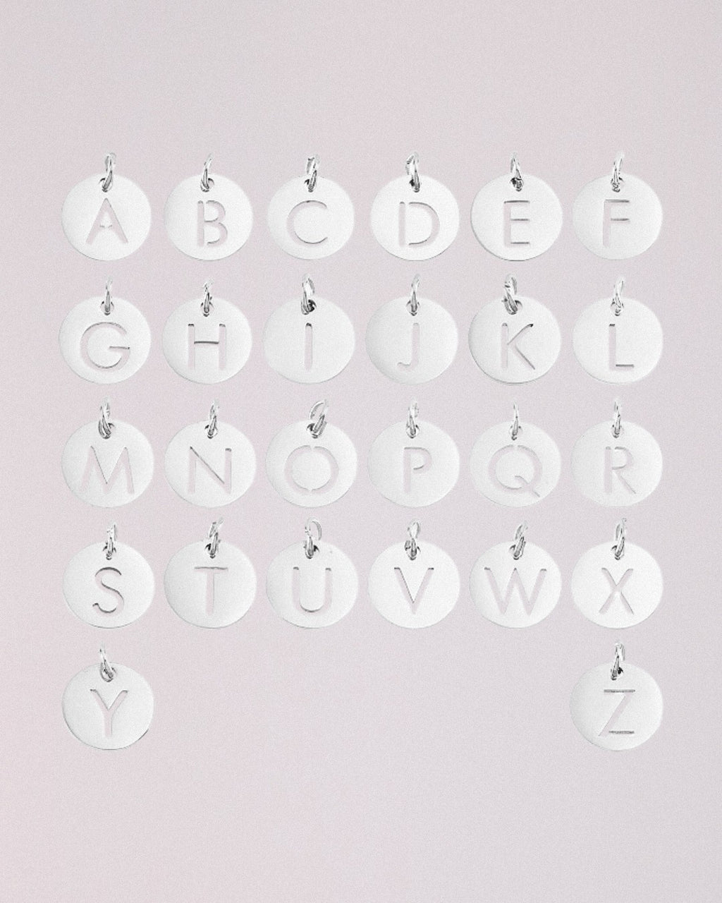 Charm Letra Acero Inoxidable
