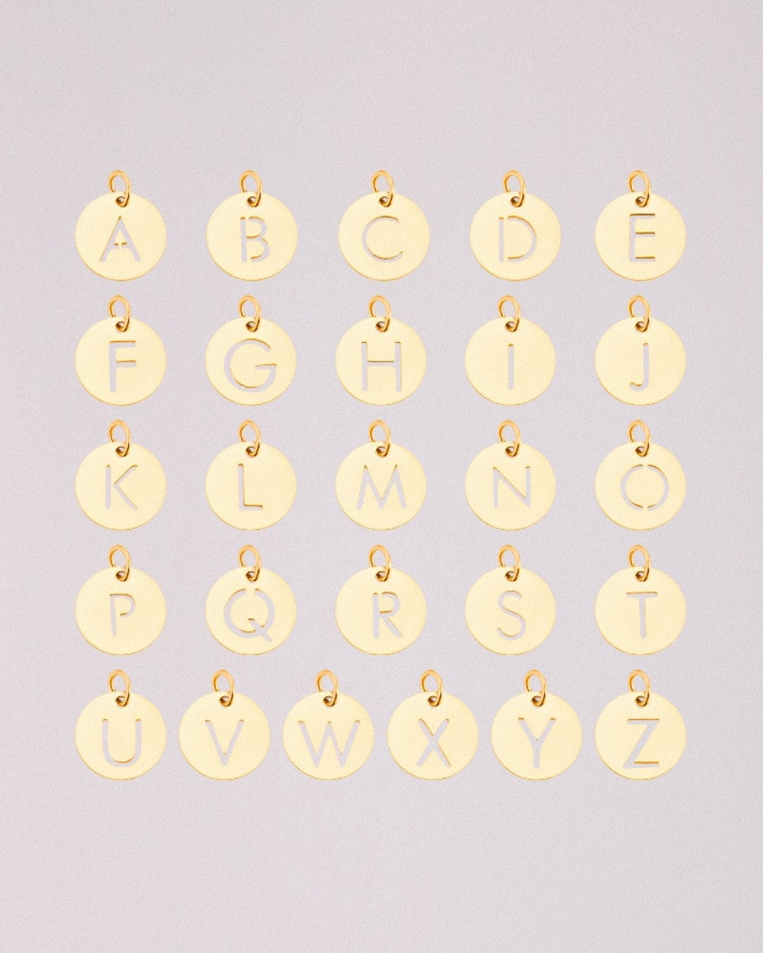 Charm Letra Acero Inoxidable Dorado